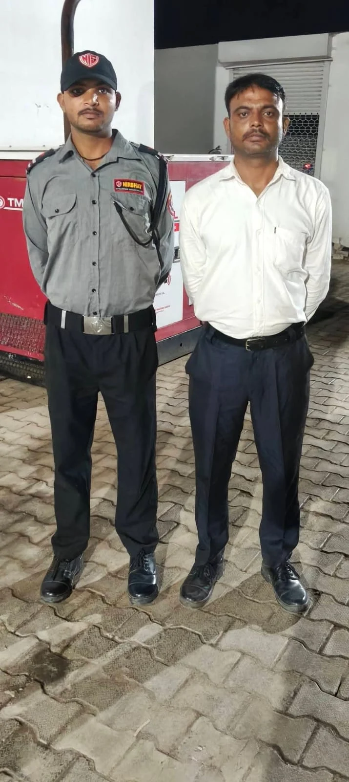 Nirbhay security guard with client representative